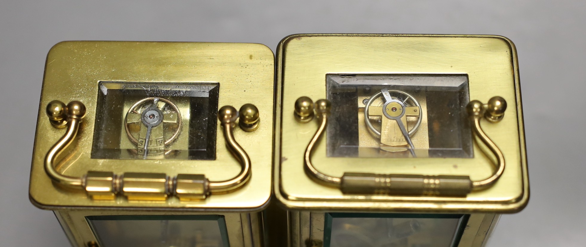 Two brass cased carriage timepieces. Tallest 12cm